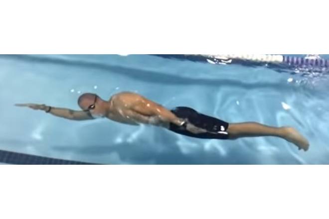Faster Swimming Requires a Solid Streamlined Position