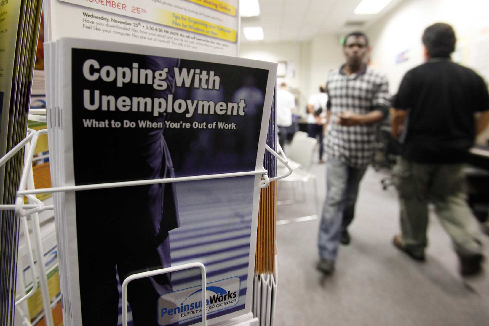 People arrive to seek employment opportunities at a JobTrain office in Menlo Park, California. 