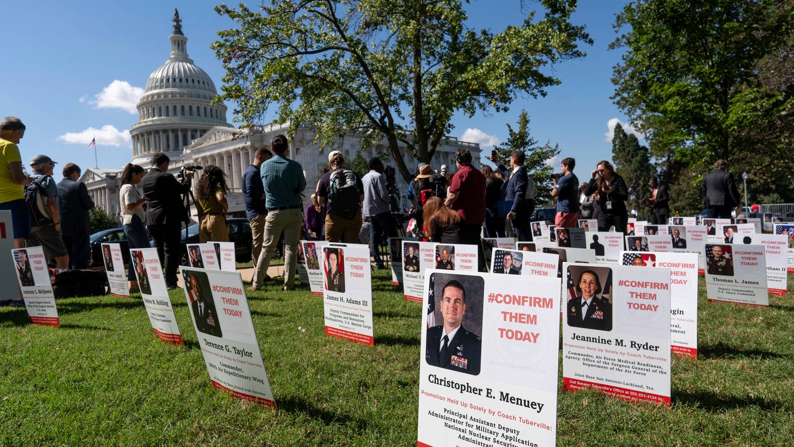 Posters of Officers Caught in Senator's Promotions Hold Dot Capitol ...