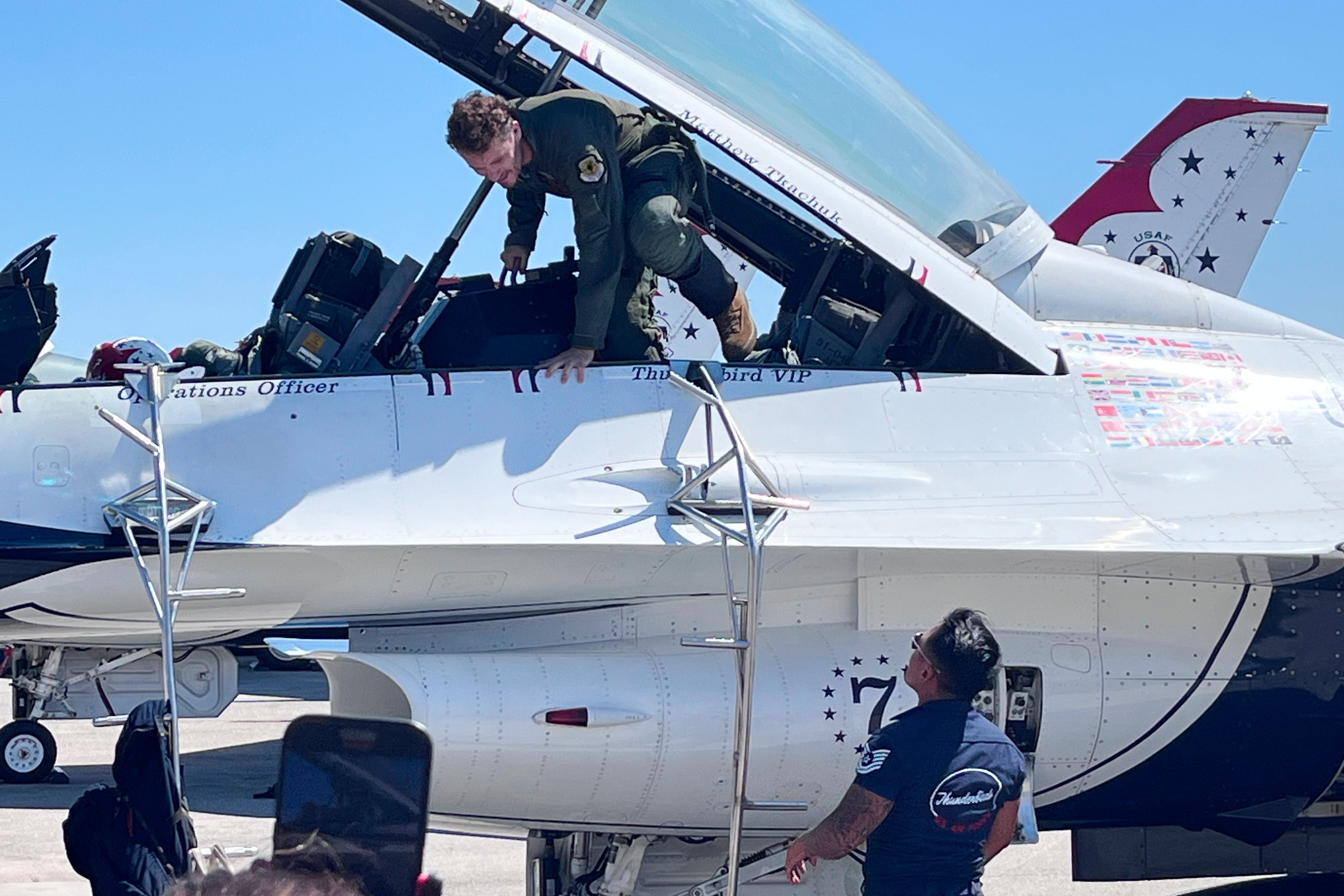 Florida Panthers forward Matthew Tkachuk exits a Thunderbirds F-16 Fighting Falcon.