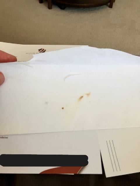 Burnt Envelopes Sent Via USPS Spark Questions of Targeted Attack, Foul Play