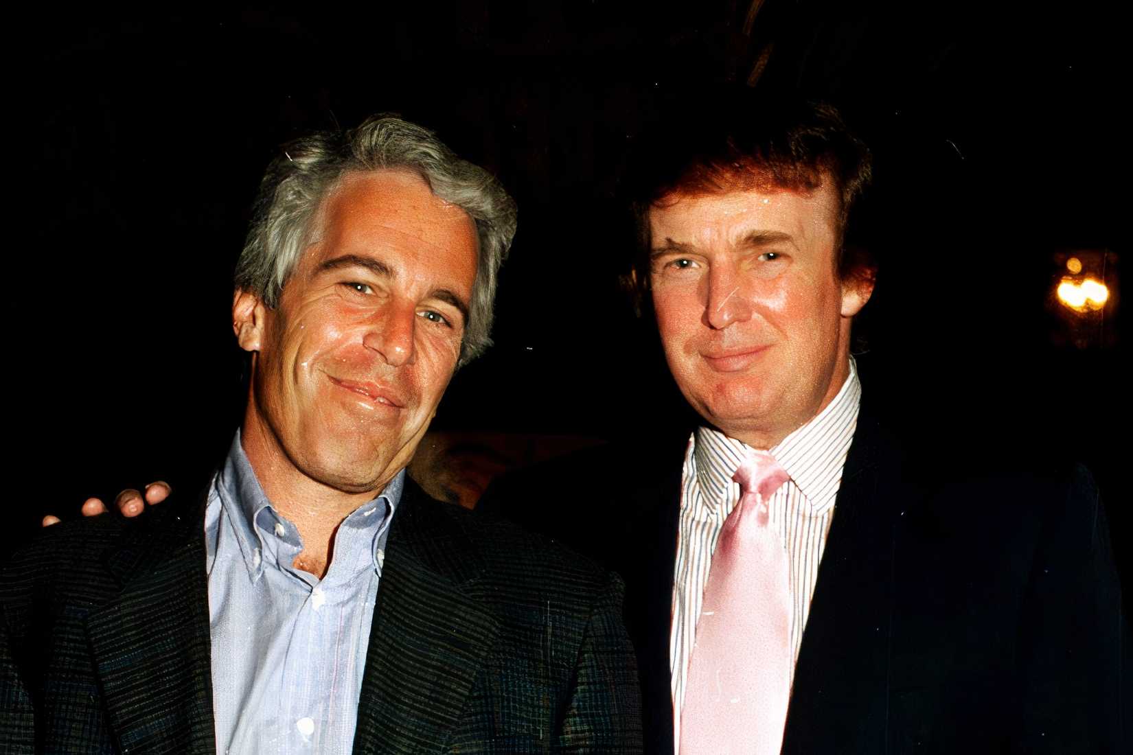 Donald Trump and Jeffrey Epstein pose together at Mar-a-Lago in Palm Beach, Florida, in 1997.