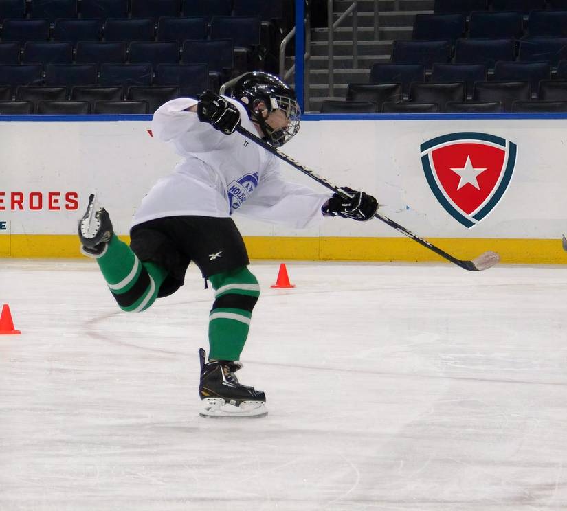 Unidentified student hockey player outfitted with gear supplied by the United Hockey League (UHL).