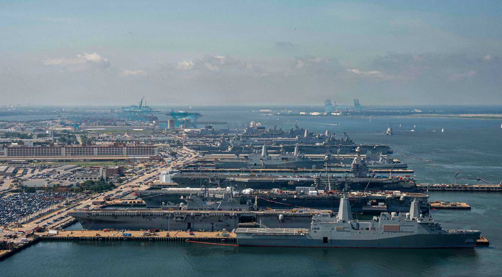 9766233