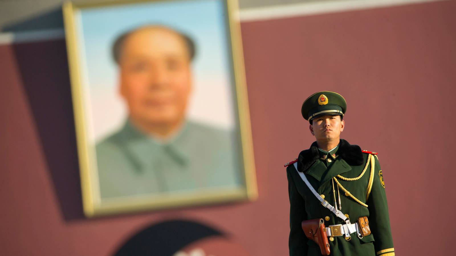 A Chinese soldier stands guard on Tiananmen Square.
