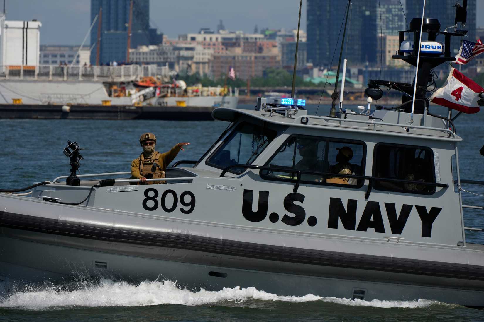 A U.S. Navy boat patrols the New York