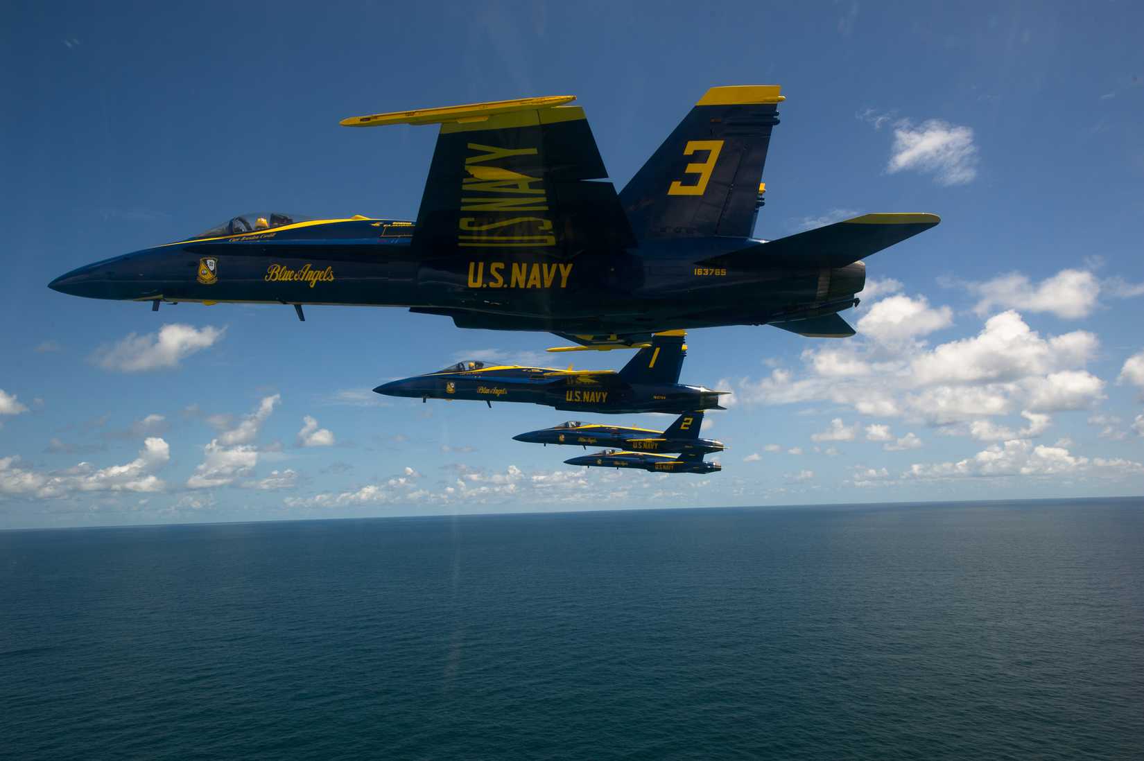 Flickr_-_Official_U.S._Navy_Imagery_-_The_Blue_Angels_maneuver_over_Pensacola_Beach._(4)