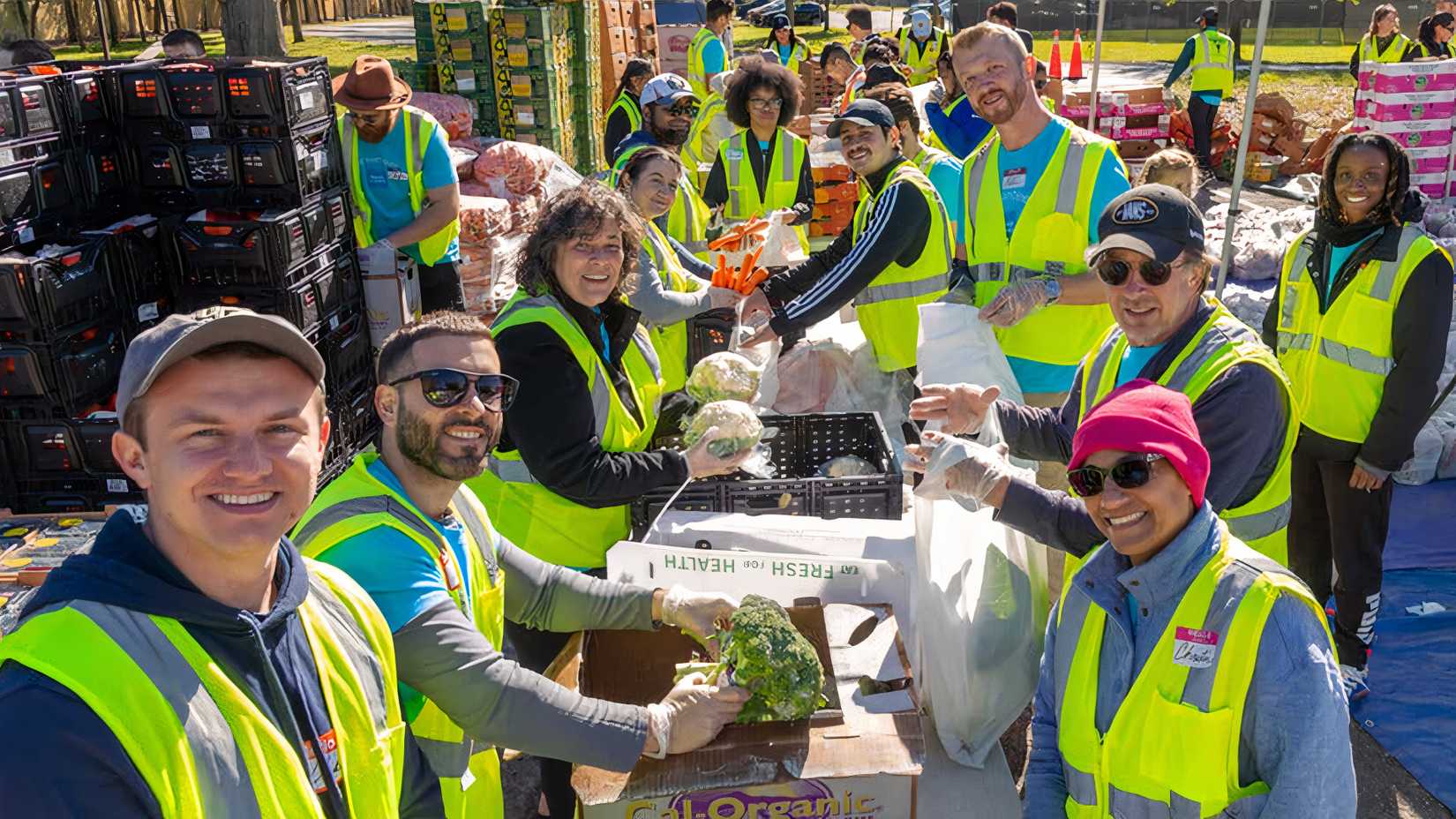 Soldiers’ Angels volunteers sort produce during a food distribution event for veterans and military families.