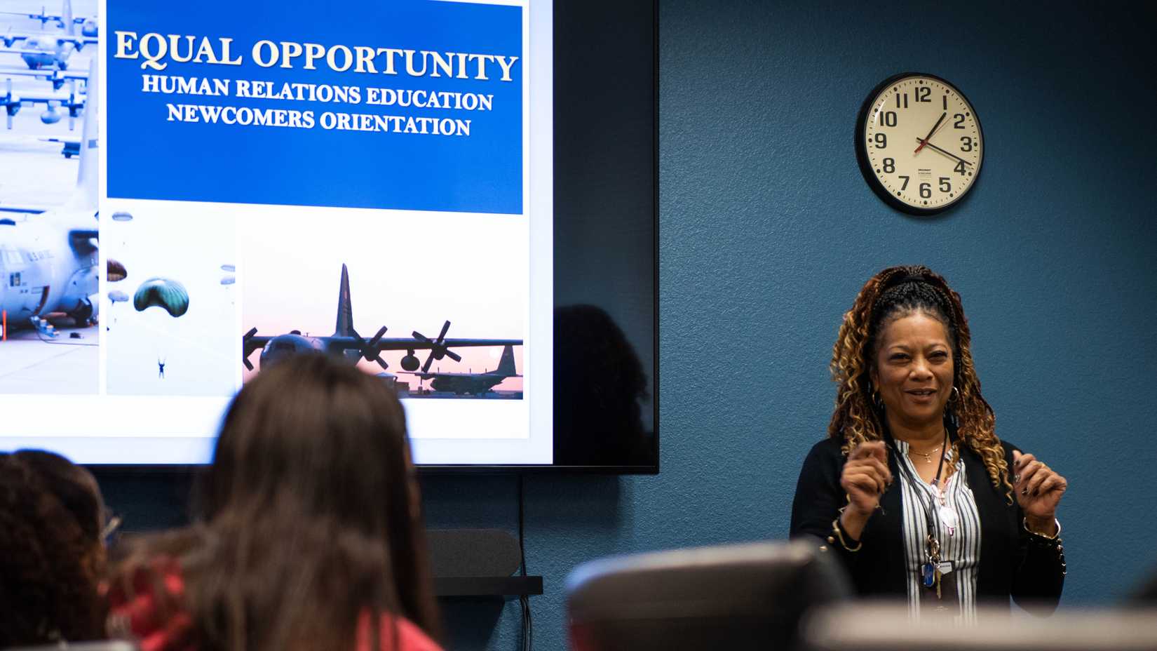 An Air Force Equal Opportunity specialist speaks to personnel during an Equal Opportunity newcomers orientation at Travis Air Force Base, California.