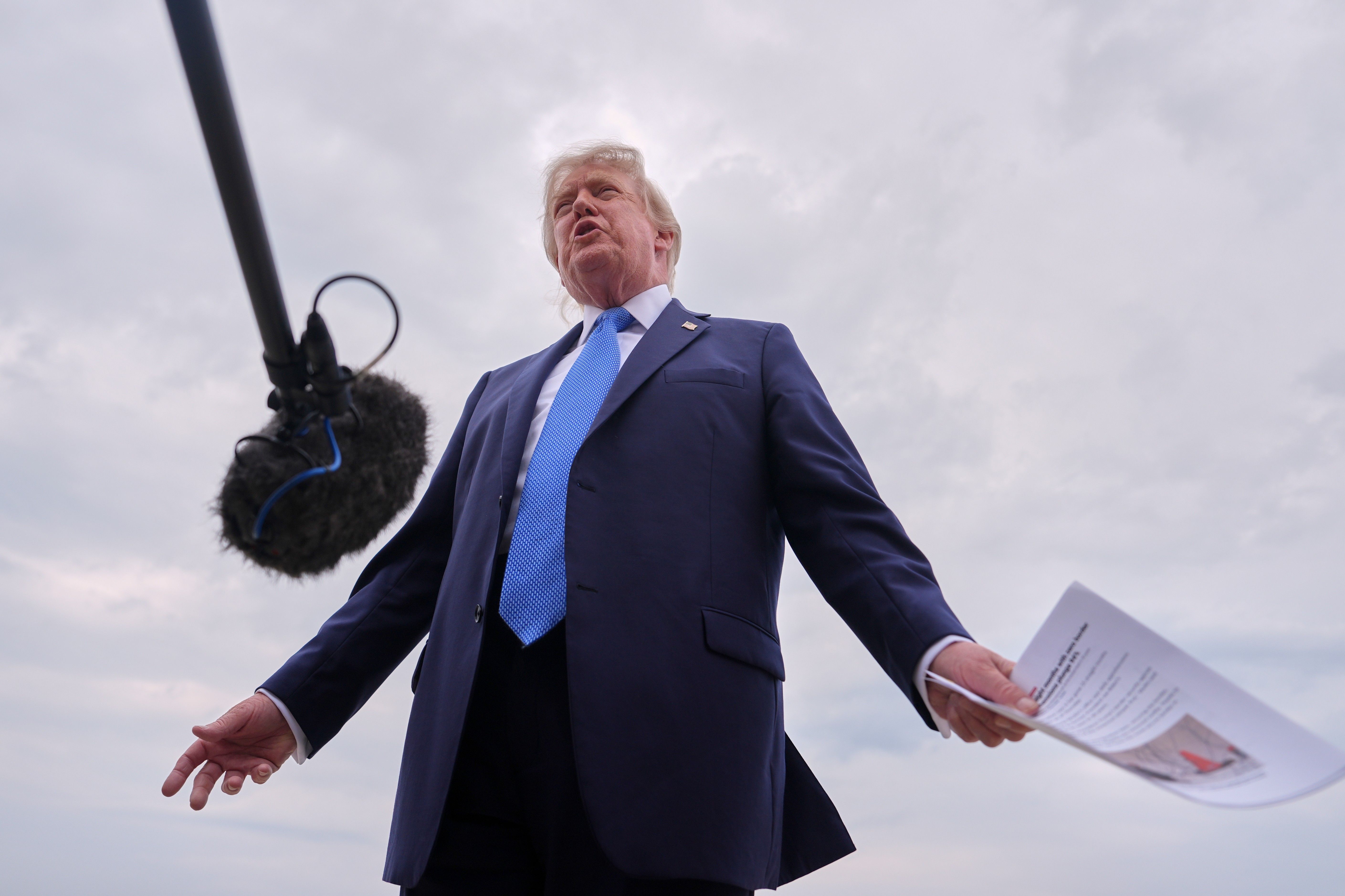Trump dismisses family concerns about grim conditions aboard USS Abraham Lincoln, saying deployment 'not nearly long enough' as ship moves to be replaced