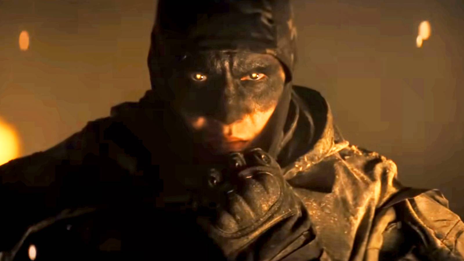 A masked former special operations soldier stares ahead in a scene from the action thriller 