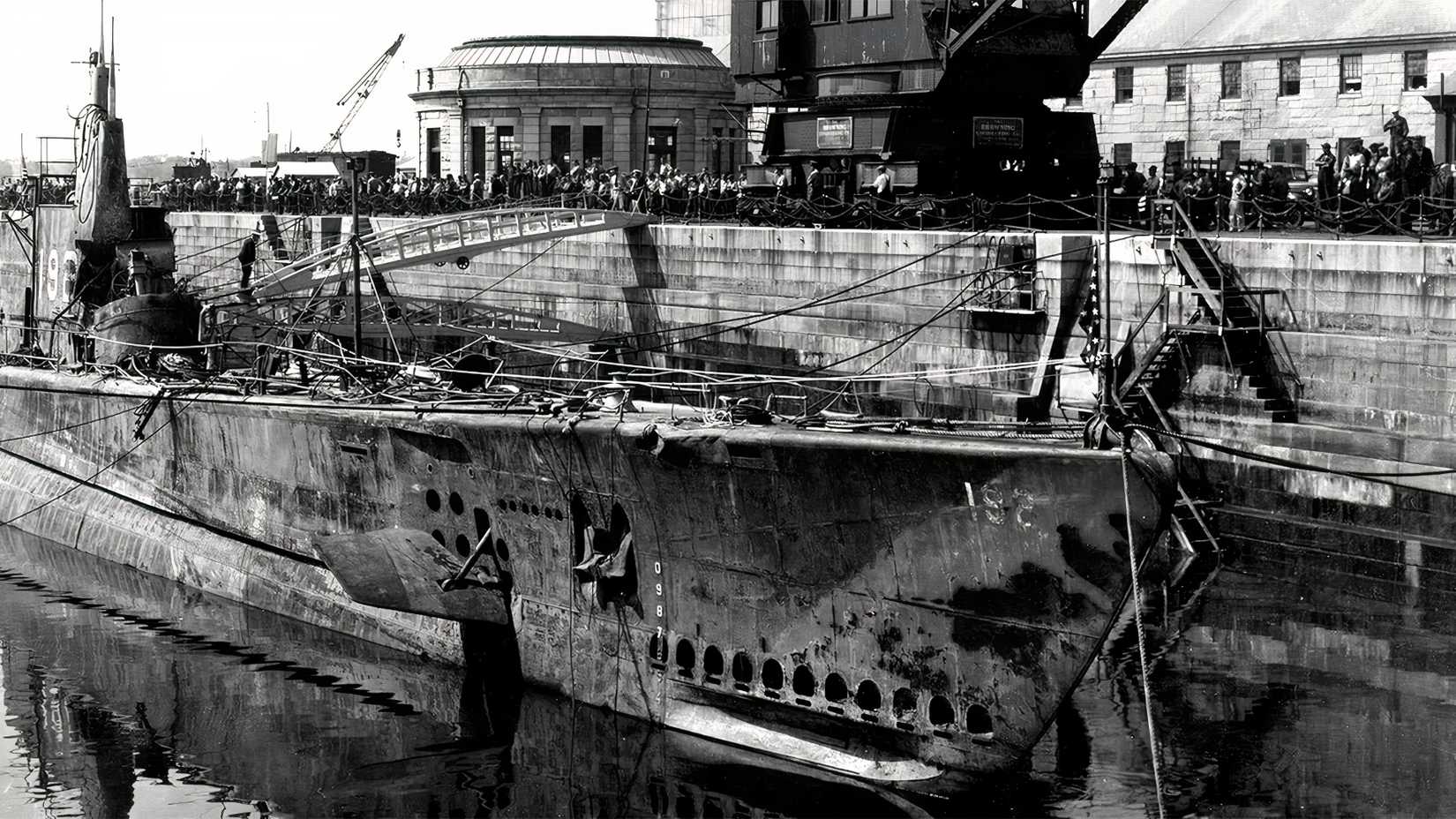 The damaged submarine USS Squalus rests in dry dock at Portsmouth Navy Yard after being raised from the Atlantic in 1939.