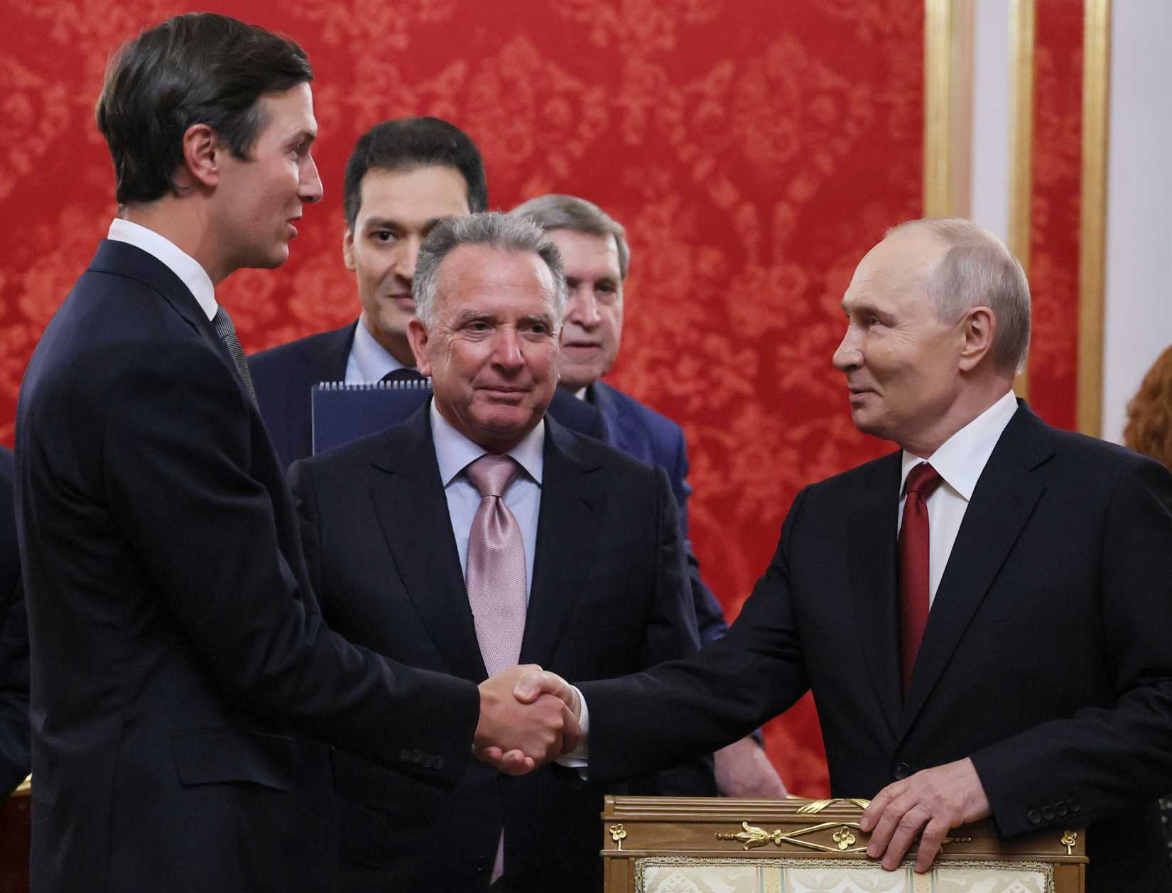 President Vladimir Putin, right, greets Jared Kushner, left, and Steve Witkoff.
