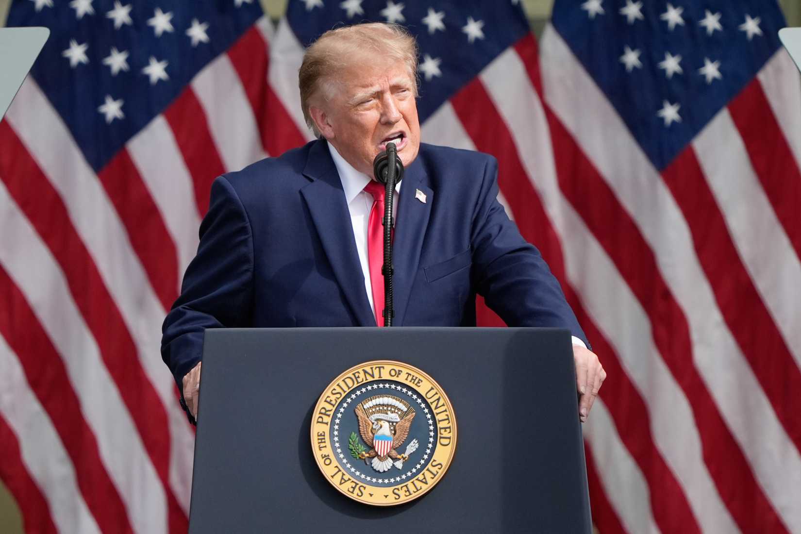President Trump, pictured here at an 9/11 ceremony in 2026, has called AI and data center threats "a hoax." (FILE).