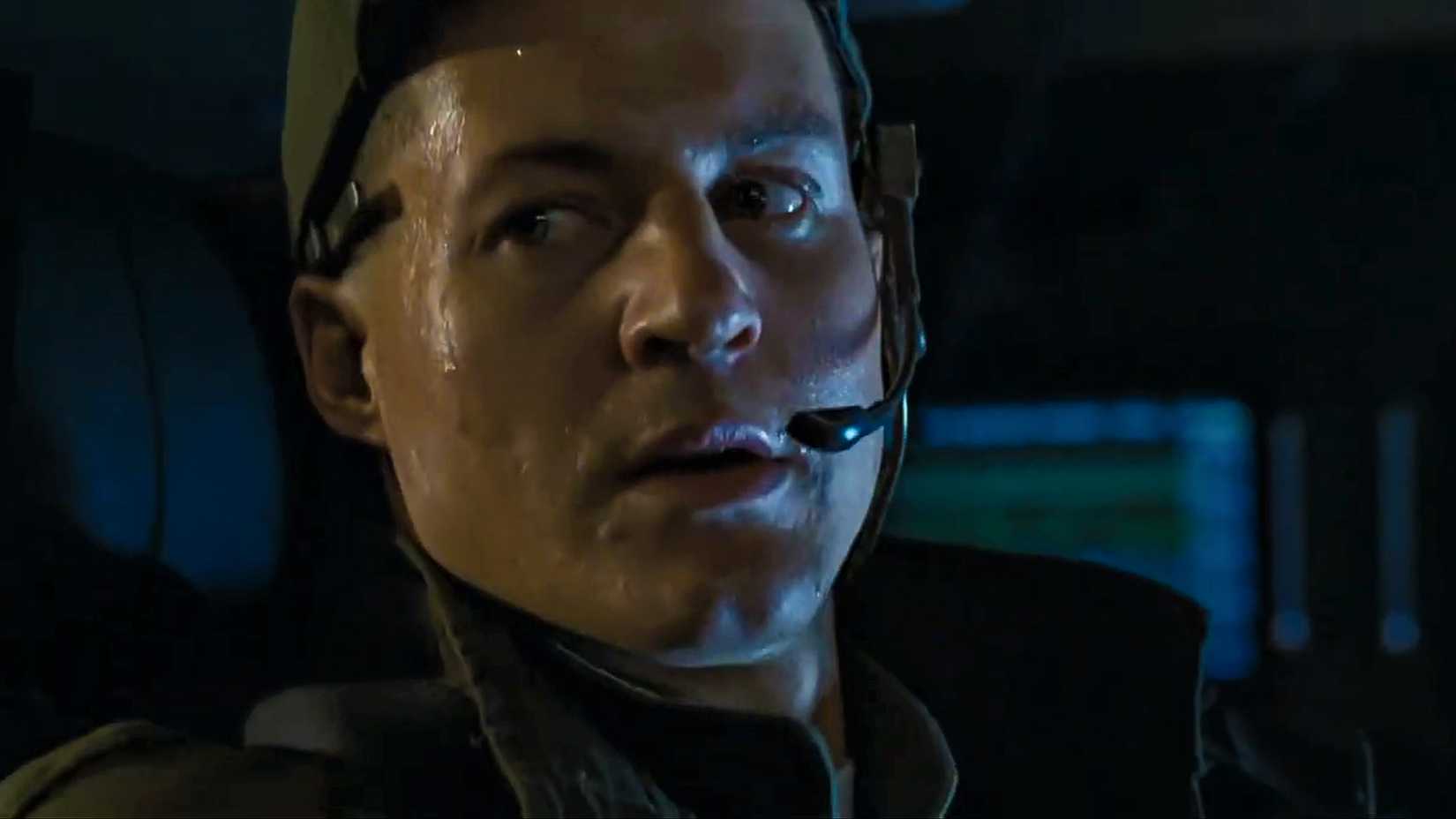William Hope as Colonial Marines Lt. Scott Gorman wearing a headset inside the armored personnel carrier in Aliens.