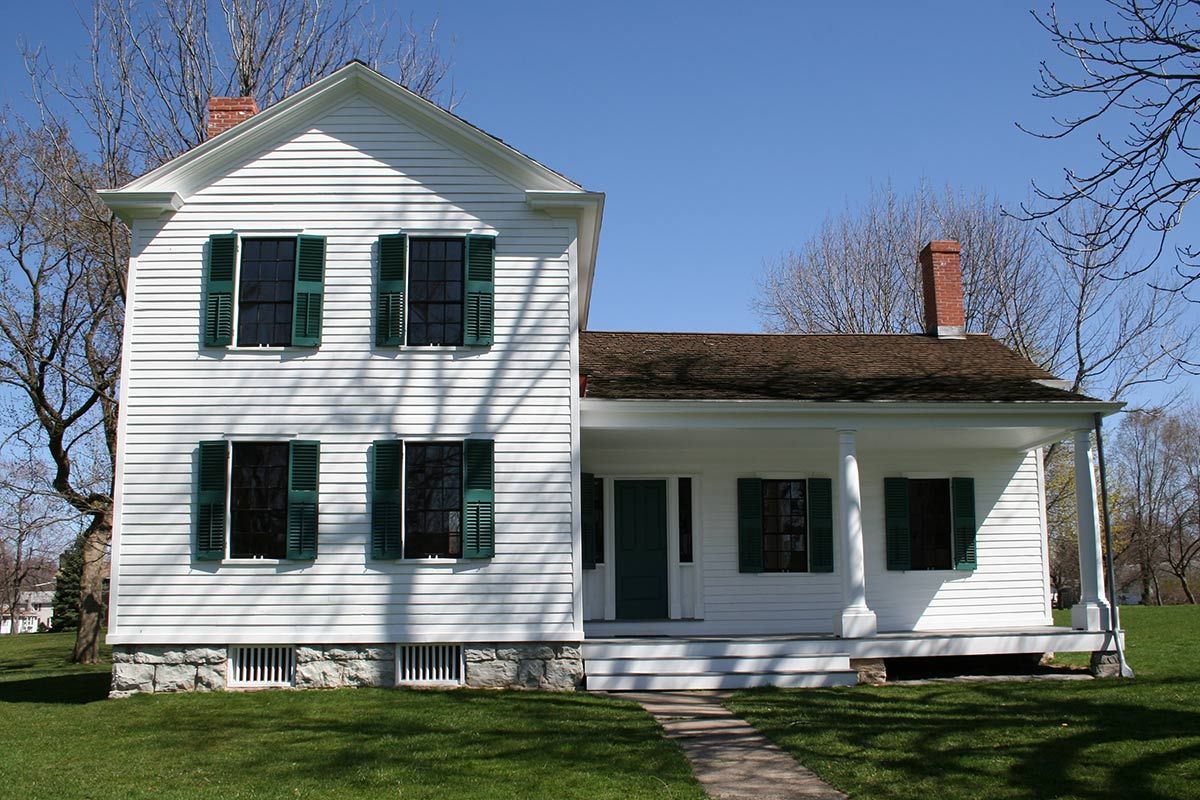White house with green shutters