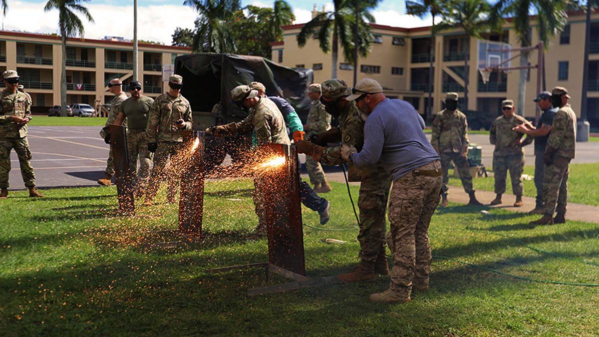 Army Testing Compact, Disposable Blowtorch for Soldier Breaching Ops