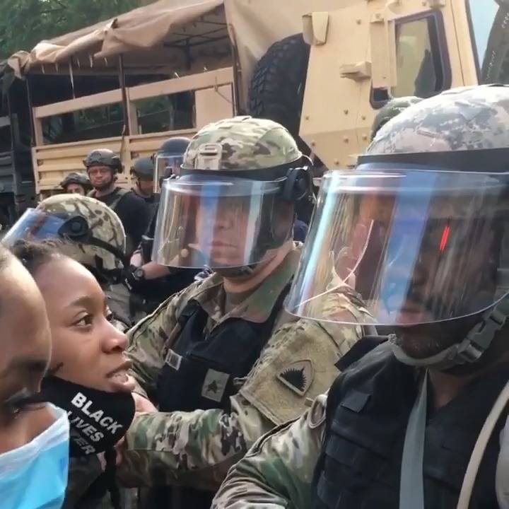 Protesters Taunt Guard Members